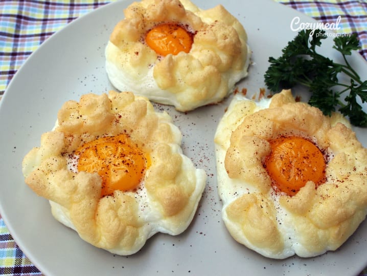 Cloud Egg Nests plated with herb garnish