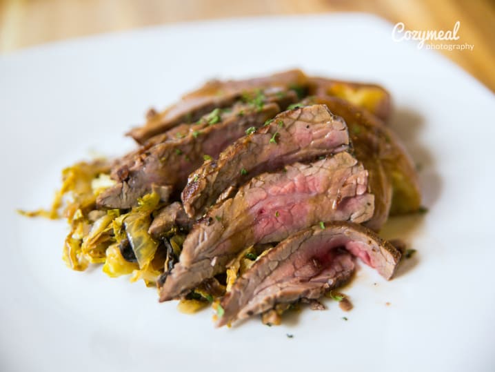 Grilled Flank Steak With Beef Jus, vegetables and potatoes