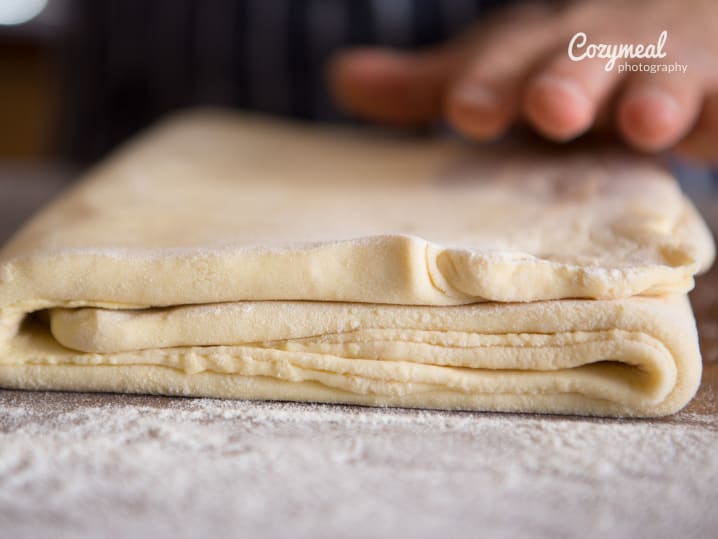 Layered and folded puff pastry dough ready for baking