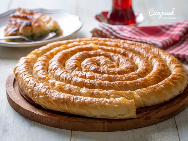 freshly baked Moroccan spiral pastry served on wooden platter