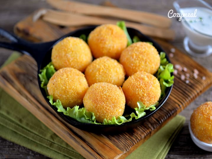 Spanish Croquettas with cheese in a black skillet pan