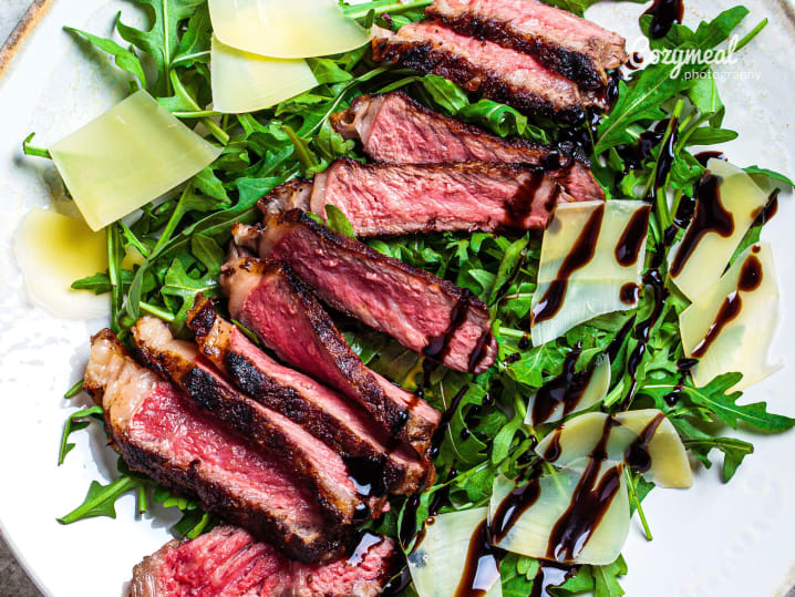 Steak Tagliata with arugula and parmesan