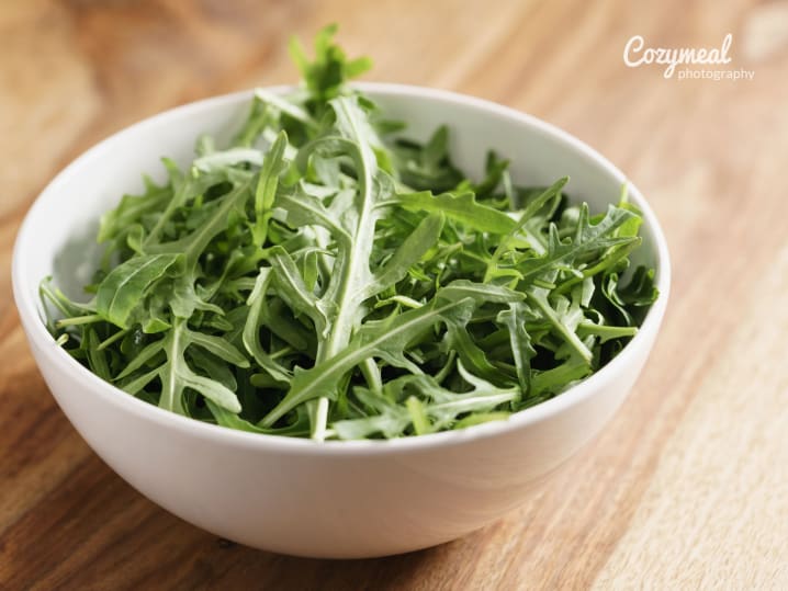 a bowl with fresh ruccula