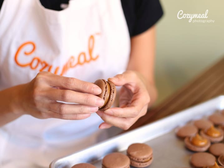 assembling chocolate macarons