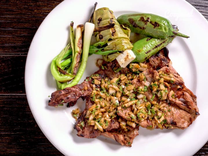 carne asada with chimichurri and vegetables