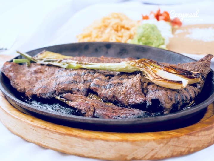 carne asada with onion and bell peppers