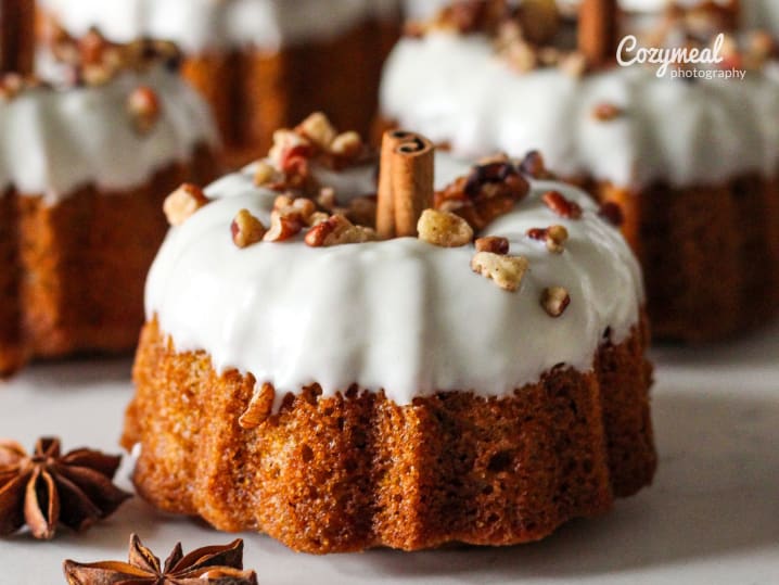 carrot mini bundt cakes with walnuts on top