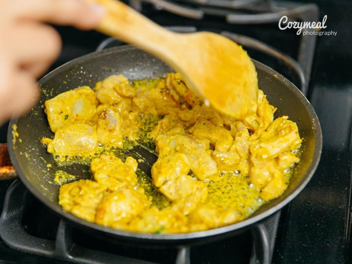 chef cooking chicken tikka masala