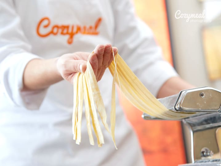 chef making homemade tagliatelle pasta