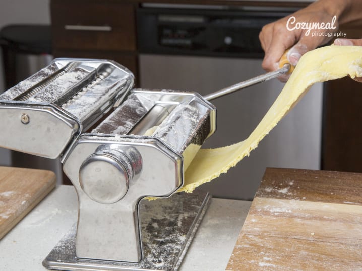 chef rolling out pasta dough