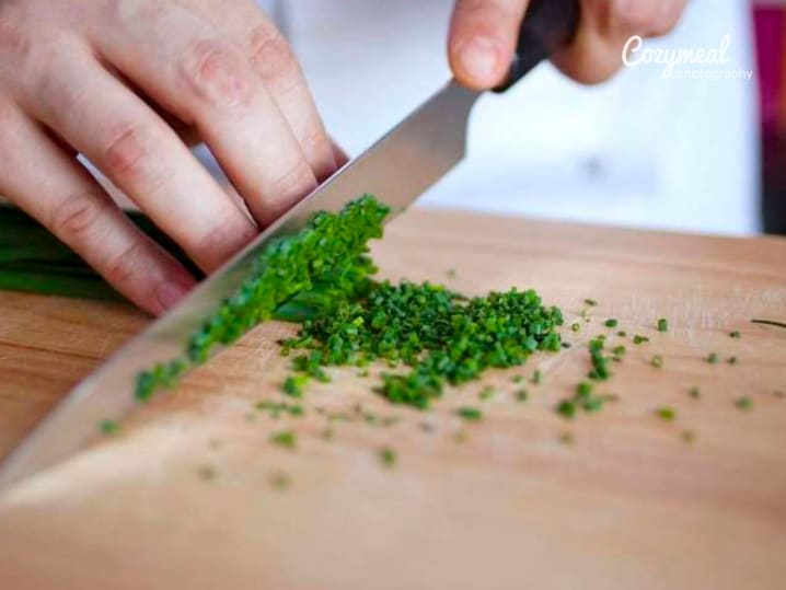 chef slicing chives