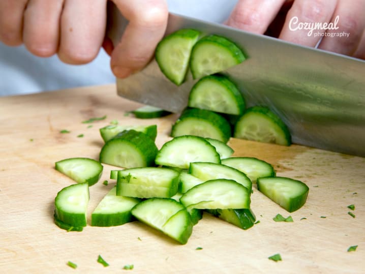 chopping cucumbers