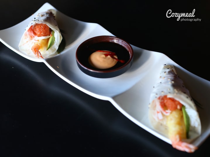 Sushi hand rolls with sauce