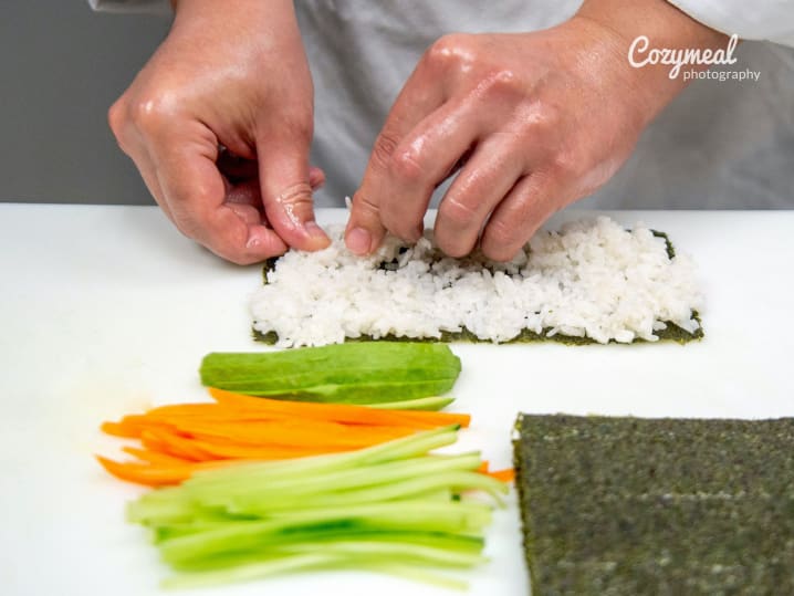 rolling veggie sushi