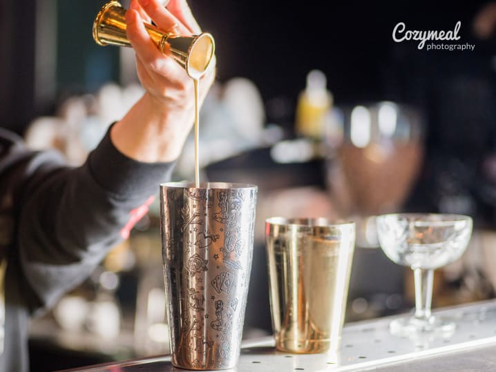 mixing cocktails in a shaker
