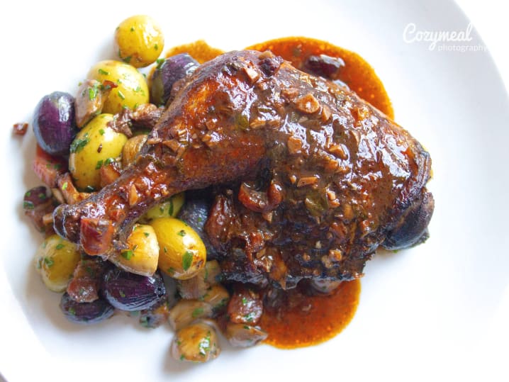 coq au vin on a white plate