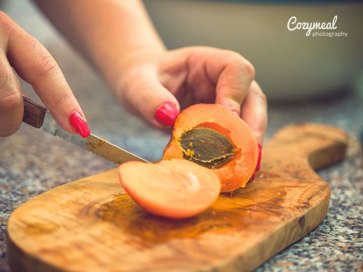 cutting apricots