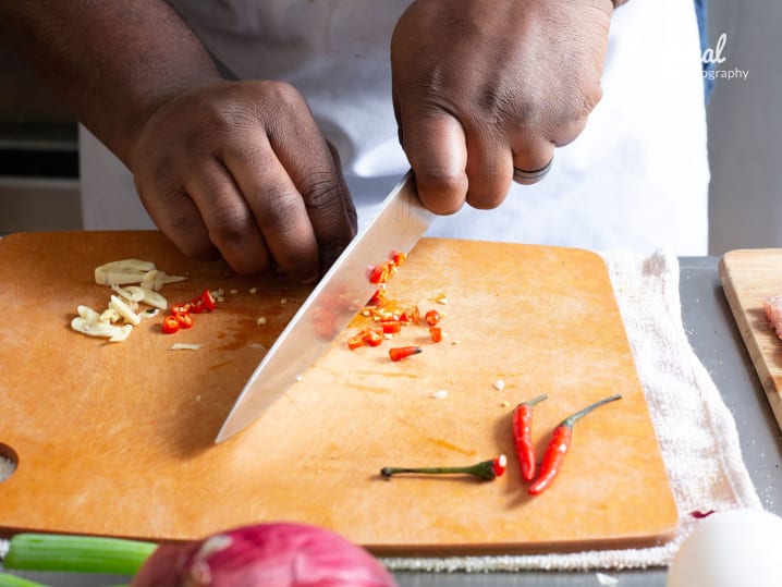 cutting red peppers