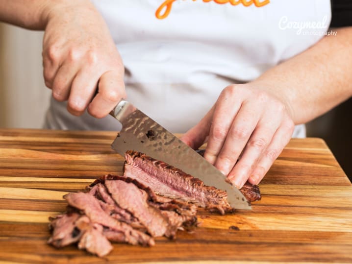 chef cutting steak tagliata