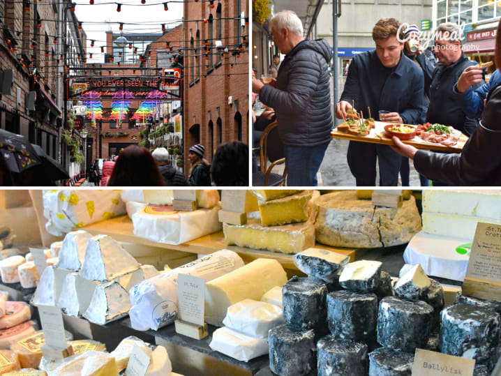 a street in Belfast people sampling cheese and charcuterie on a food tour cheese on display