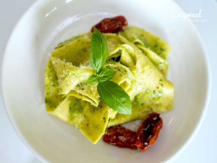 fresh pasta with pesto and sausage