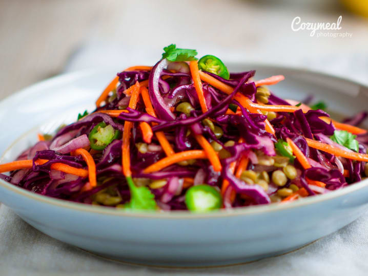 vibrant, healthy slaw salad served in white bowl