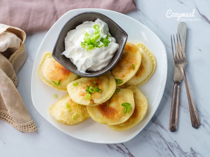 homemade pierogies with sour cream