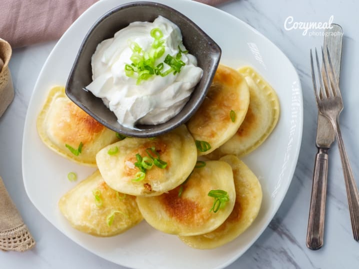 homemade pierogies with sour cream