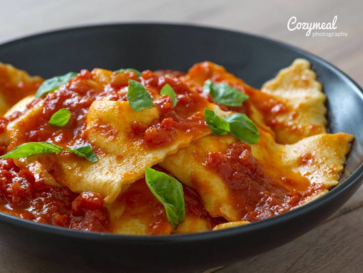 homemade ricotta ravioli with tomato sauce