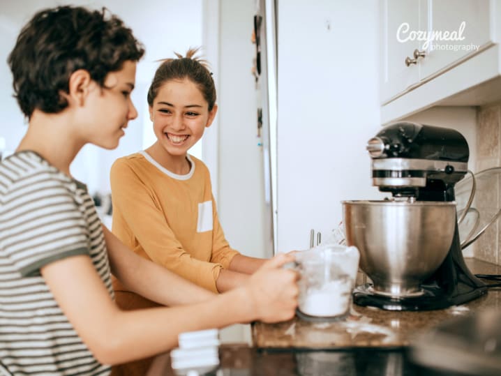 kids cooking french food in a cooking class