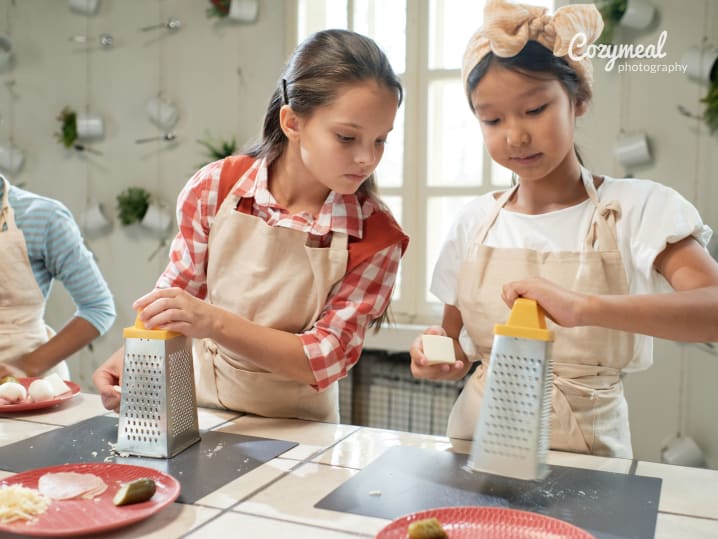 kids grating cheese