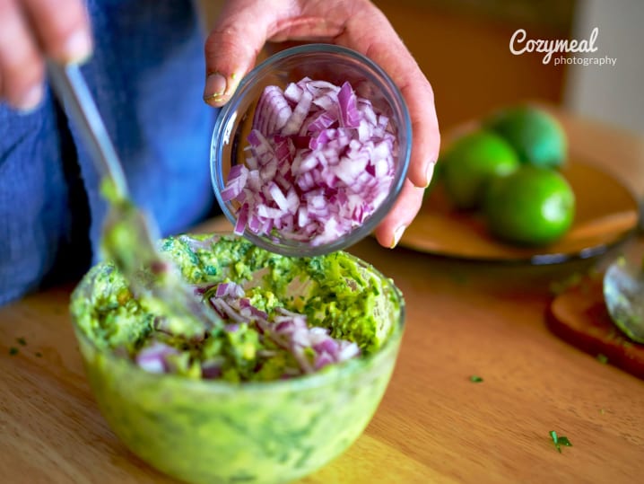 making guacamole in a team building competition