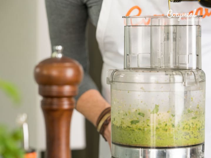 chef blending pesto sauce