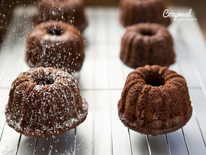 mini chocolate bund cakes out on a cooling tray