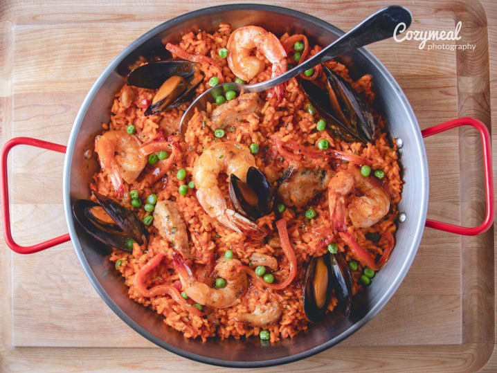 paella with vegetables, mussels and shrimp