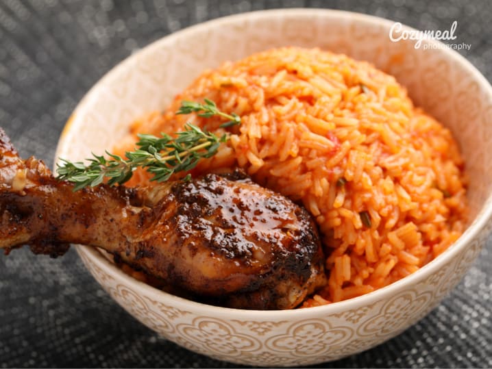 pan roasted chicken over jollof pilaf