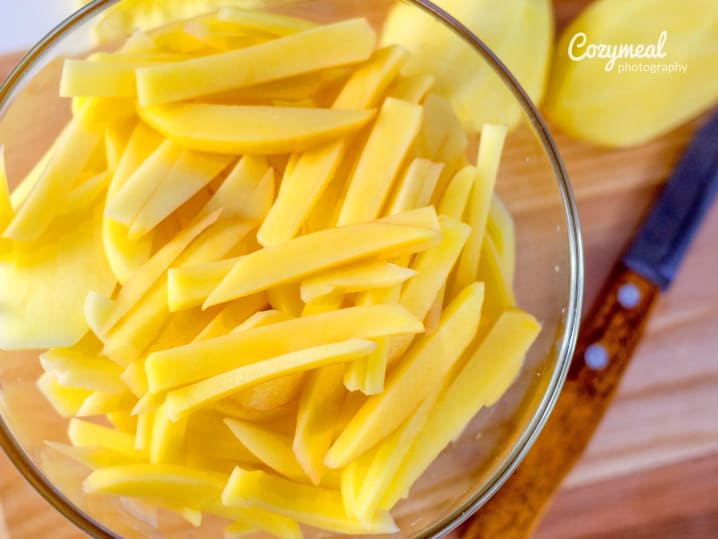 peeled and sliced potatoes to make fries