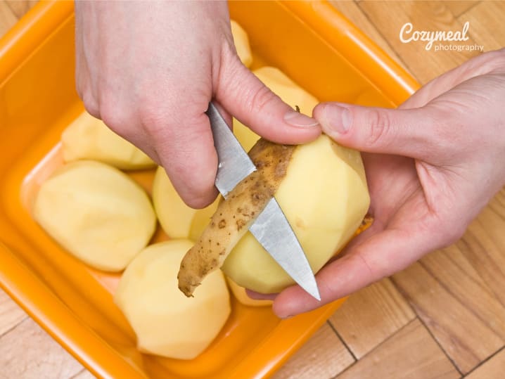 peeling potatos