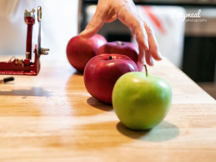 picking an apple on the table