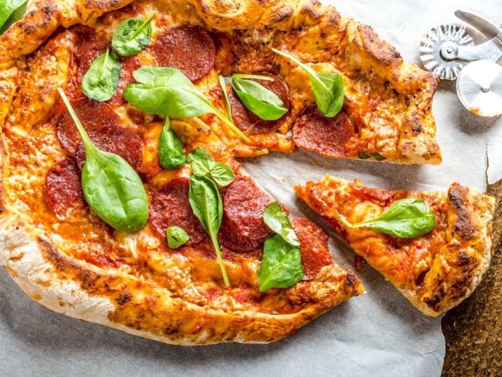 rustic pizza with pepperoni and spinach