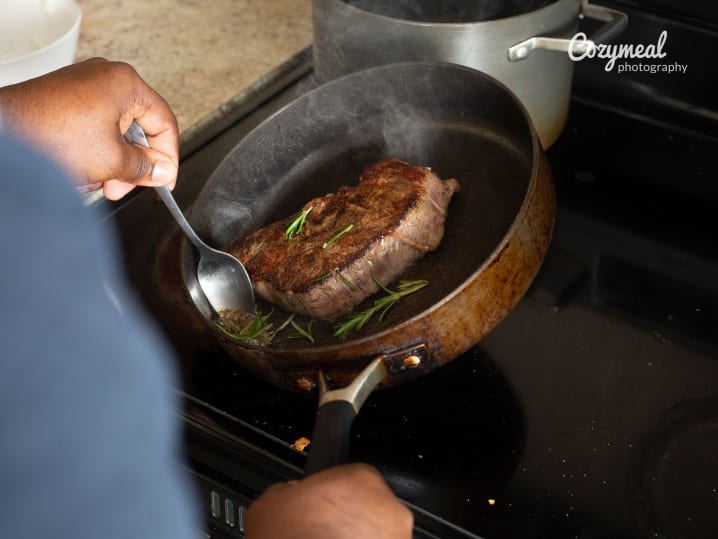 searing steak with herbs and butter
