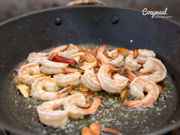 shrimp in a pan with spices