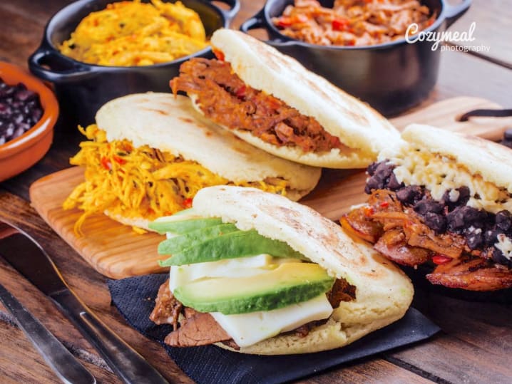 steak and pork arepas with avocado and black beans