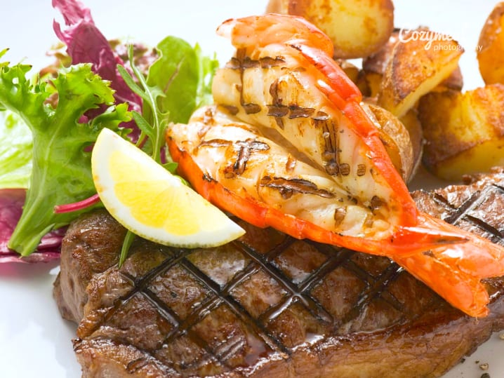 surf and turf steak and lobster with potatoes