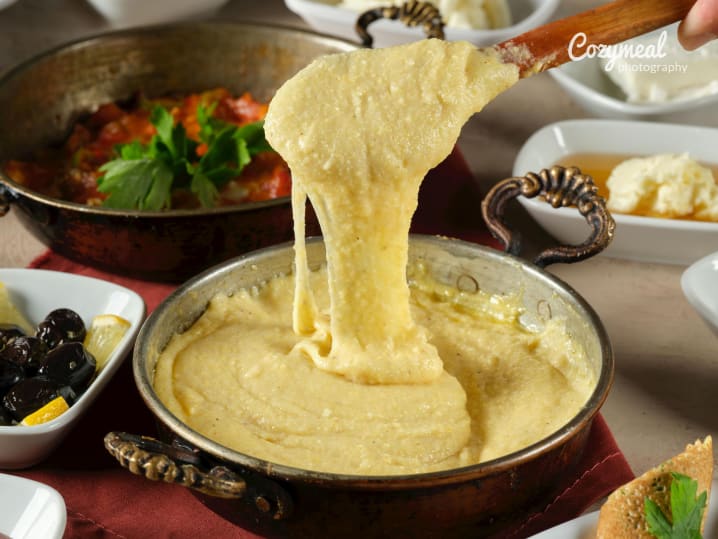 whisking creamy polenta