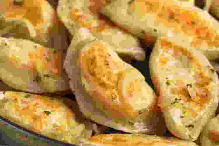 homemade perogi is a comforting and cheesy potato side dish