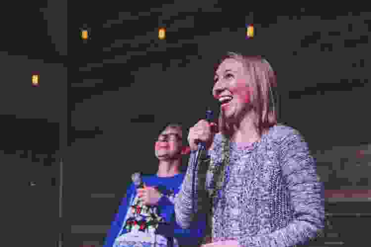 a karaoke night is a great work christmas party idea that's actually fun