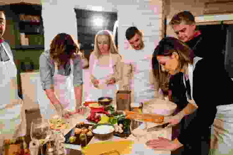 a group of people enjoying a team building cooking class