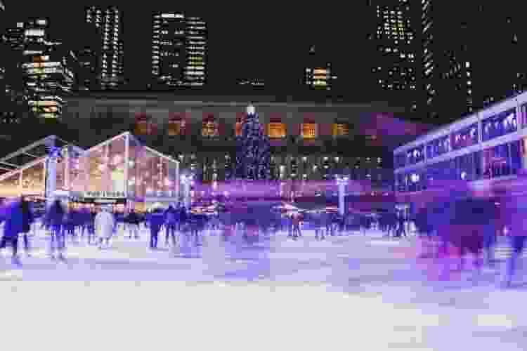 city ice skating rink at night