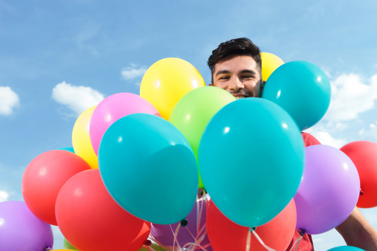 surrounded by balloons
